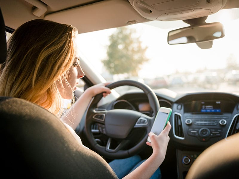 Distracted lady driver